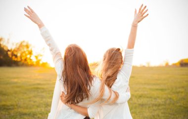 Young,women,are,having,fun,on,the,green,field,in