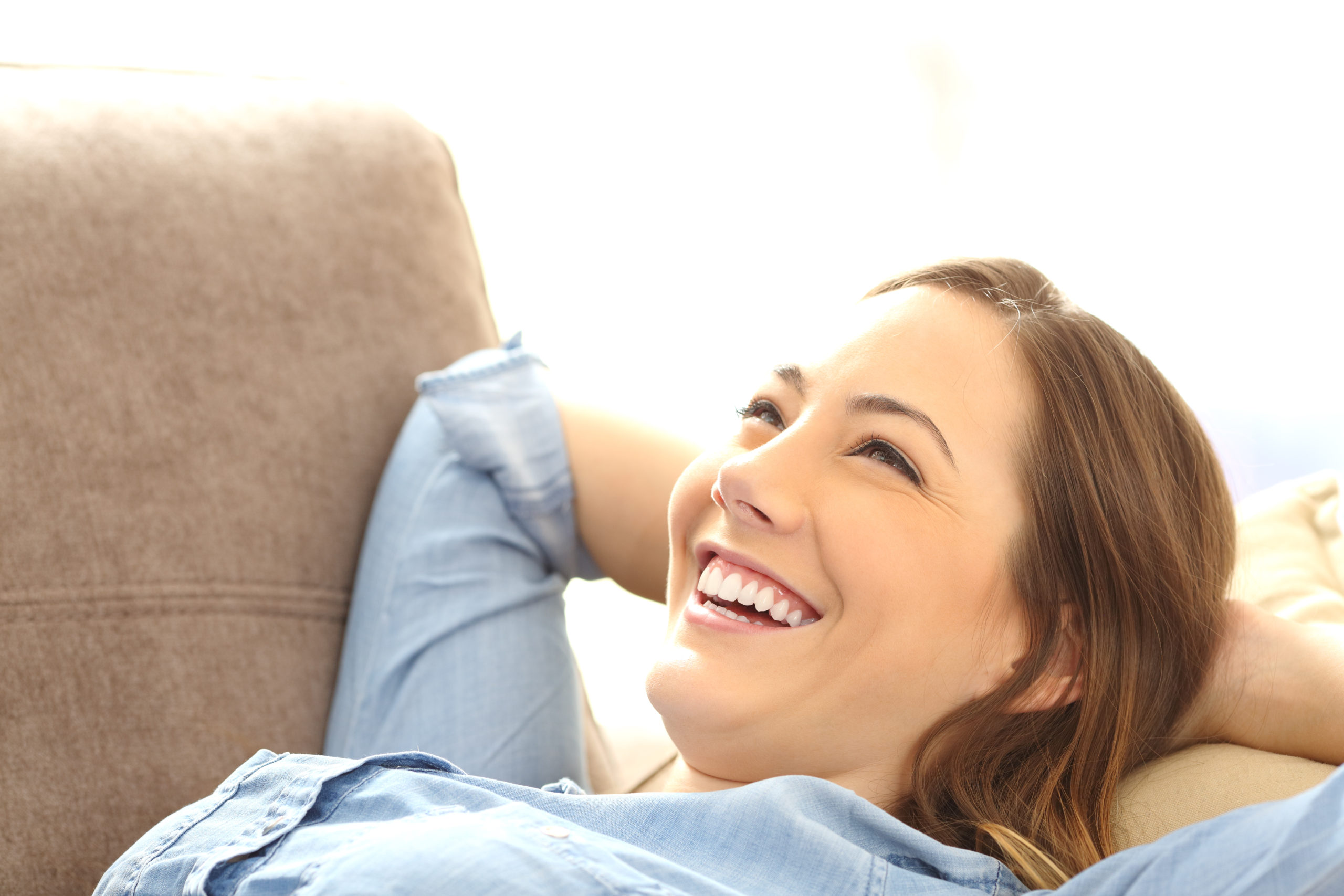 Portrait,Of,A,Single,Happy,Woman,Relaxing,And,Laughing,After