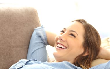 Portrait,Of,A,Single,Happy,Woman,Relaxing,And,Laughing,After